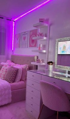 a bedroom with purple lighting and pink furniture in the corner is lit up by lights