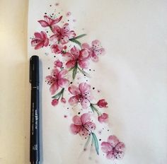 a drawing of pink flowers on white paper