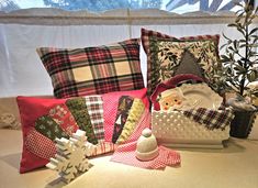 decorative pillows and christmas decorations are on display