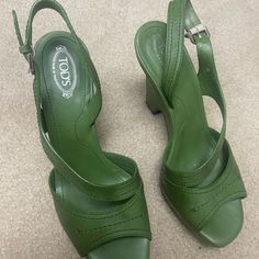 Green 8.5 Very Stylish Tod’s Classic Green Leather Heels, Casual Green Heels With 4-inch Heel, Green Round Toe Sandals For Formal Occasions, Casual Green Heels With Cushioned Footbed, Casual Green Heels With Heel Strap, Green Heels With Branded Heel Counter, Green Leather Sandals For Formal Occasions, Designer Green Block Heels, Green Leather Heels With Cushioned Footbed