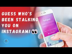 someone is holding up their cell phone with the text guess who's been stalking you on instagram?