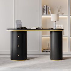 a black and gold desk with a laptop on it in front of a bookcase