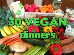 a table topped with lots of different types of vegetables