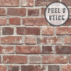 a brick wall with the words peel and stick on it