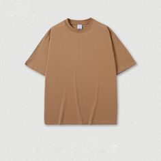 Tee Oversized Solid Color Crew Neck T-shirt, Oversized Basic Solid Color T-shirt, Oversized Solid Color T-shirt For Summer, Relaxed Fit Solid Color Top For Streetwear, Basic Plain Tops For Streetwear, Basic Brown Tops With Relaxed Fit, Basic Brown Relaxed Fit Tops, Casual Plain Brown T-shirt, Oversized Solid Color Tops For Streetwear