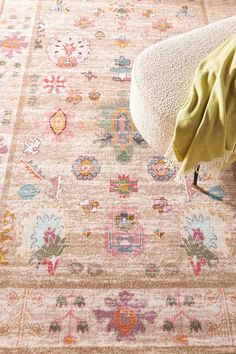 an area rug with various colors and designs