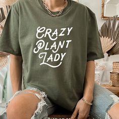 Crazy Plant Lady Sweatshirt , Plant Mom Sweat , Plant Lover Gifts ,Plant Lover Shirt , Gardening Gift , Plant Lady Sweat, Garden Shirt ORDERING: 1. Review all photos 2. Choose Size and Color from drop-down menu 3. If personalization box is available, add your text color 4. Add each shirt to cart one at a time 5. Click "Add to Cart" - you can go back to add more products 6. Click "Proceed to Checkout" 7. Add note to seller for any requests BULK DISCOUNTS AND SPECIAL REQUESTS: We offer bulk discou Plant Lover Gifts, Garden Shirt, Crazy Plant Lady, Gardening Gift, Gardening Shirts, Plant Lover Gift, Plant Mom, Plant Lady, Garden Gifts