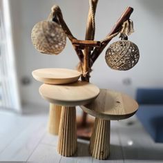 a wooden table topped with lots of round objects