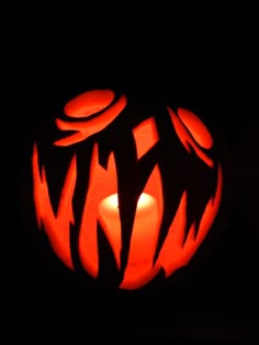 a carved pumpkin with the word w on it