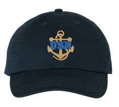 "Anchor the outdoors with this US Navy anchor logo embroidered hat. Elevate your style with this baseball hat adorned with the iconic US Navy anchor logo, embroidered proudly on the front. Crafted for outdoor and hiking enthusiasts, this cap not only represents your connection to the Navy but also complements your adventurous spirit. Whether you're on the trail or out in the city, this hat combines fashion with a tribute to the sea. Features: 100% bio-washed chino twill Unstructured, six-panel, Us Navy Anchor, Navy Gifts, Anchor Logo, Navy Hat, Navy Anchor, Navy Hats, Navy Logo, Logo Hat, Embroidered Hat