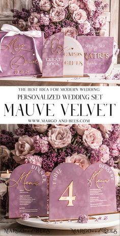 the wedding stationery is displayed with purple flowers and gold foiled numbers on it