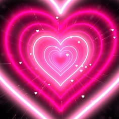 neon hearts are arranged in the shape of a heart