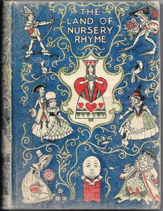 an old book with pictures of people in costumes on the cover and text that reads,'the land of nursery rhyme '