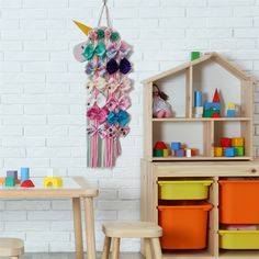 a child's play room with toys and storage