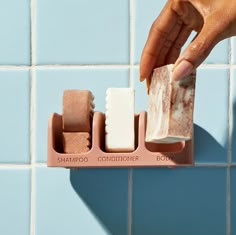 Ensure your Bottle-Free Beauty faves stay clean & organized in the shower with this must-have soap dish. It features a chic, self-draining design to keep your bars dry & fresh so you can enjoy them longer. Chic & functional design that holds up to to 3 bars! Compatible with all Kitsch bars Effective drainage system with self-draining slots and raised bottom Keeps your bars dry & goop-free Made from 100% recycled plastic Includes 1 set of removable suction cups Dimensions: 5.5’’ W x 2.15’’ H x 3. Gooey Bars, Protein Shampoo, New Hair Growth, Conditioner Bar, Shea Body Butter, Damaged Hair Repair, The Shower, Shampoo Bar, Natural Fragrances