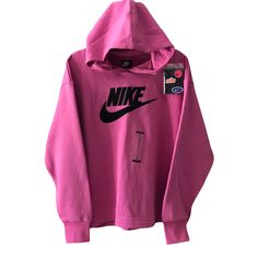 Nike Sportswear Icon Clash Fleece Hoodie Women’s Size Plus 1X Pink CT0616-691 NWT Easygoing, relaxed fit  Ribbed cuffs and hem streamline the look Product Features Soft, cozy brushed-back fleece keeps you comfy all day long Comes with bright and fun removable patches for a DIY look Patches feature hook-and-loop attachment 80% cotton, 20% polyester Machine wash The Nike Sportswear Icon Clash Hoodie is imported. Customize your look in the Women's Nike Sportswear Icon Clash Hoodie. A classic hoodie Sporty Logo Print Hoodie For Loungewear, Winter Athleisure Sweats With Logo Print, Trendy Streetwear Sweats With Ribbed Cuffs, Athleisure Logo Print Sweatshirt For Spring, Spring Athleisure Sweatshirt With Logo Print, Sporty Fleece Hoodie With Logo Print, Athleisure Moisture-wicking Sweatshirt For Winter, Winter Athleisure Moisture-wicking Sweatshirt, Moisture-wicking Athleisure Sweatshirt For Winter