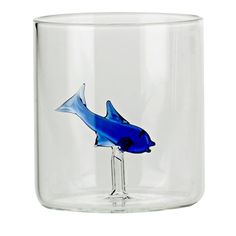 a glass vase with a blue fish on it's bottom and an upside down design