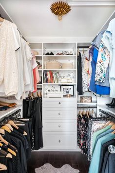 an organized closet with clothes and shoes