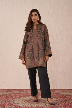 This Woollen Suit Set is laden with eloquent weaves in beautiful hues. This set makes for a versatile must-have. It will provide you with much-needed comfort and warmth this winter season. Order yours now!  *Dry Clean only SPECIFICATIONS: Color Black Fabric Wool Blend Product Code Sifat13 Brown Long Sleeve Winter Sets, Unstitched Long Sleeve Sets For Fall, Elegant Long Sleeve Brown Kurta, Embroidered Multicolor Winter Sets, Elegant Long Sleeve Kurta For Winter, Unstitched Long Sleeve Kurta For Fall, Unstitched Long Sleeve Kurta For Winter, Winter Suits For Women Indian, Pakistani Kurta Designs