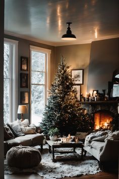 a living room filled with furniture and a christmas tree