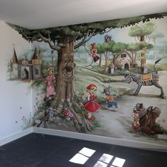 this is an image of a children's room painted in wonderland land style murals