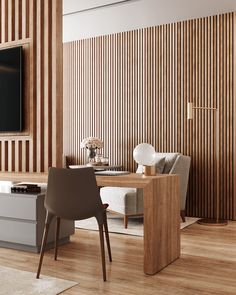 a living room with wood paneling on the wall and a television mounted to the wall