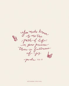 a quote written in red ink on a white background with two butterflies flying around it