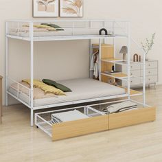 a white bunk bed with drawers underneath it