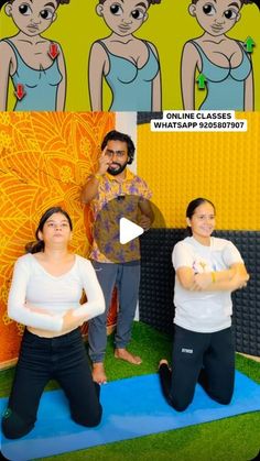 two women and a man are doing yoga in front of a wall with cartoon images