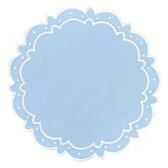 a light blue doily with white dots on the edges and an oval shape in the center