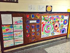 the bulletin board is decorated with different colored circles and dots on it's sides