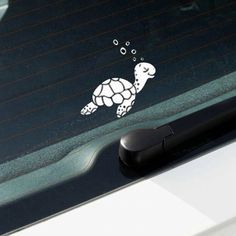 a turtle with bubbles on its back window