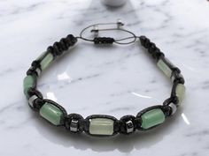 🌿 Embrace harmony and with this certified genuine Green Aventurine and Hematite natural stone bracelet, designed with a striking geometric macrame pattern. Handcrafted with durable cord, this bracelet offers a blend  elegance, perfect for anyone seeking 🍀 Ideal for daily wear or as a thoughtful gift to bring positivity into someone's life! 🎁 Geometric Macrame, Stone Macrame, Natural Stone Bracelets, Macrame Bracelet, Macrame Bracelets, Macrame Patterns, Green Aventurine, Stone Bracelet, Geometric Design