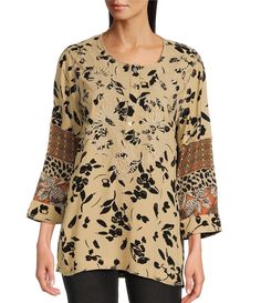 From John Mark&#x2C; this tunic top features:Woven fabricationRound neckline3/4 sleevesMixed printFloral embroidery detailingPullover constructionApprox. 29-30" lengthViscose/rayon/polyester  Machine wash/tumble dry Imported. Printed 3/4 Sleeve Blouse For Fall, Floral Embroidered Tunic Top For Fall, Floral Embroidery Tunic Top For Fall, Fall Floral Embroidered Tunic Blouse, Fall Floral Embroidery Tunic Blouse, Fall Split Neck Tunic, Printed Tunic Blouse For Fall, 3/4 Sleeve Embroidered Blouse For Fall, Fall Rayon Tops With 3/4 Sleeves