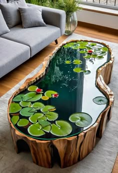 a living room with a couch and table made out of wood, water lilies