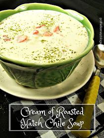 a bowl of cream of roasted match chile soup