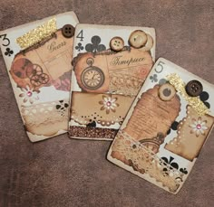 four cards with buttons and lace on them