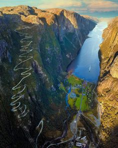 an aerial view of the mountains and water with writing on them that says welcome to new zealand