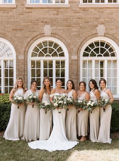 a group of women standing next to each other