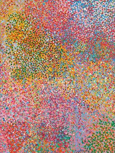 an abstract painting with multicolored dots on it