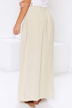 Beige Buttoned Maxi Skirt Beige Maxi Skirt With Elastic Waistband, Pleated Maxi Skirt For The Beach, Beige Tiered Lined Skirt, Beach Pleated Skirt Bottoms, Cream Skirted Bottoms With Elastic Waistband, Beige Long Maxi Skirt For Vacation, Cream Relaxed Skirted Bottoms, Beige Tiered Maxi Skirt For The Beach, Beige Lined Skirt Bottoms For Vacation