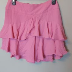 Nwt Express Ruffled Skirt Size 10 Sooo Cute Ladies! I Purchased & Didn't Need It Was Bought 01/21. It Is Pink With Three Layers Of Ruffles Very Soft Lightweight With A Type Of Satin Layer Underneath. Zip Partial In The Back With A Hook & Eye Closure As Pictured. Bow In The Back As Well! High Waist Relaxed Mini Skirt With Ruffles, High Waist Mini Skirt With Ruffles, Relaxed Fit Tiered Ruffle Skort, Ruffled Short Skirt For Day Out, Short Ruffled Skirt For Day Out, Relaxed Tiered Ruffle Skort, Tiered Ruffled Skort With Relaxed Fit, Pink Skort With Ruffle Hem, High Waist Ruffled Skort