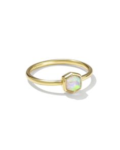 You can’t go wrong with the Davie 18k Gold Vermeil Band Ring in White Kyocera Opal. Our signature icon reimagined in a modern, minimalist design made to wear every day. Metal 18k Yellow Gold Vermeil What is Vermeil? Vermeil (that’s pronounced ver-may) is a gold plating technique that dates back to the 19th century. While other jewelers plate over less durable metals, our vermeil starts with a Sterling Silver base and is plated with just over 2.5 microns of 18k Gold to create a more timeless piec Opal Solitaire Ring, Engagement Rings Sale, Bar Jewelry, Sports Jewelry, Modern Minimalist Design, Demi Fine Jewelry, Initial Jewelry, New Jewelry, Kendra Scott Jewelry