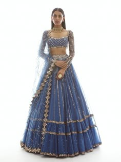 Vvani By Vani Vats | Dull Blue Linear Drop Tier Lehenga | INDIASPOPUP.COM Dull Blue, Vani Vats, Orang India, Indian Outfits Lehenga, Wedding Lehenga Designs, Gaun Fashion, Traditional Indian Dress, Blue Lehenga, Indian Bridal Outfits