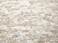 a white brick wall is shown with no mortar