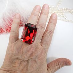 Huge Red Stone Ring, Ruby Crystal Ring, Light Siam ring Red Ring Huge Big Stone Cocktail Oversize rectangle Crystal Ruby Cherry True Red Men Adjustable Ring Statement Wedding Jewelry,Light Siam,SR84 This is a WOW bling ring! So big, sparkly but yet comfortable and adjustable made with top quality XXL (37mm x 25.5mm) rectangle octagon premium crystals . The setting is custom design for my studio, soldering and metal coating are done in Israel. This one is a real Head-turner! No one can ignore the Red Gemstone Rings For Party, Party Ruby Gemstone Rings, Elegant Red Crystal Ring For Party, Red Gemstone Jewelry With Rectangular Stone, Red Rectangular Gemstone Jewelry, Red Open Ring Crystal Ring As Gift, Red Emerald-cut Ring For Gift, Red Crystal Open Ring For Gift, Red Rectangular Stone Jewelry For Gifts