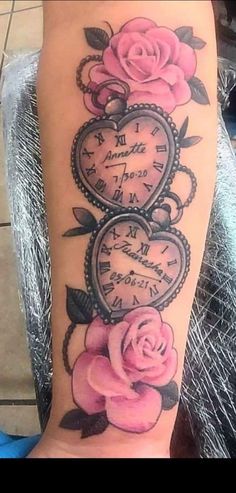 a woman's arm with pink roses and an old clock tattoo on it,