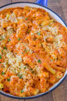 a casserole dish filled with pasta and cheese