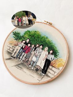 an embroidery project with people standing in front of a tree on the side of a wall