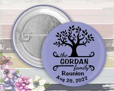 a pink button with the words, the gordan family reunion on it next to flowers